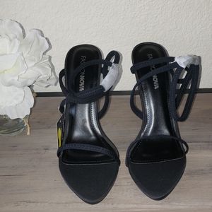 Beautiful black stretchy strap heeled sandals